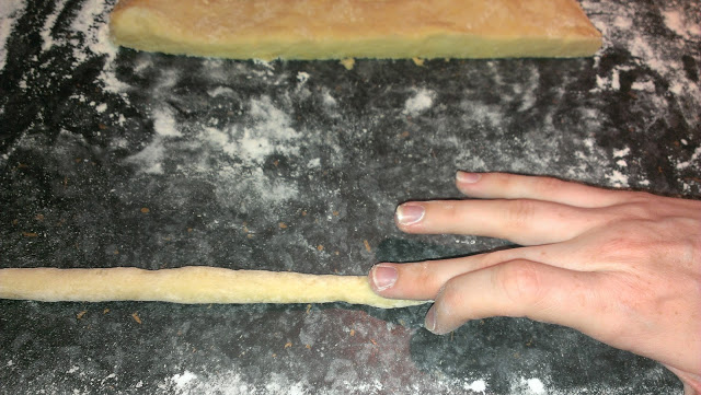 Roll the Gnocchi into sausages to your preferred thickness then cut into small squares. 