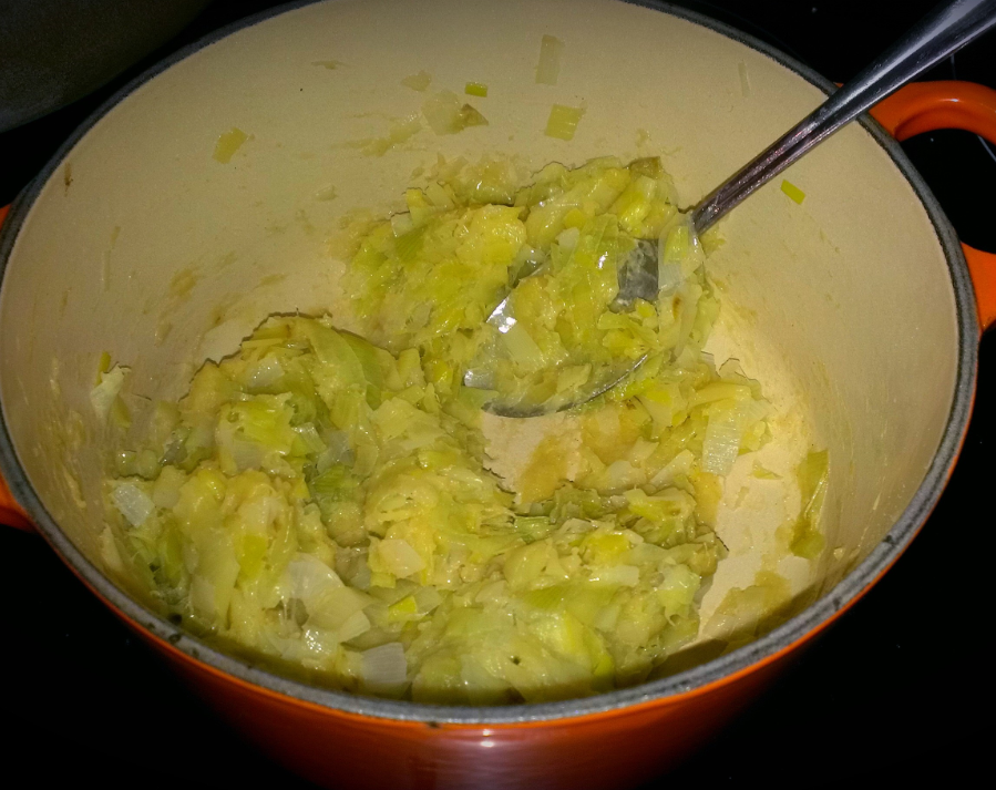 Adding flour to make a roux 