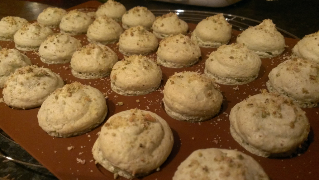 Baked cooling macaroons with a nubbly nutty topping 