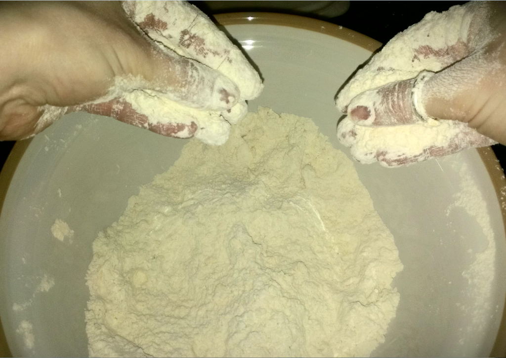 Rub the butter into the flour using fingertips. Raise your hands to get some air into the scones 
