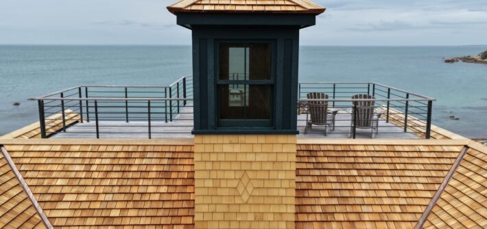 Red cedar roof with cupola and rooftop terraces
